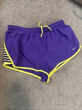 Nike Women's Purple Dri-Fit Athletic Shorts with Yellow Trim Size M